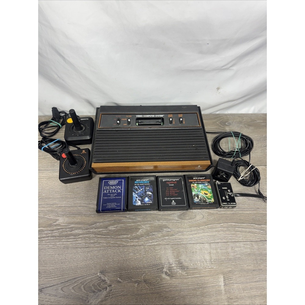 Atari 2600 4-Switch Woodgrain Console Bundle w/ 2 Joysticks, 4 Games Working